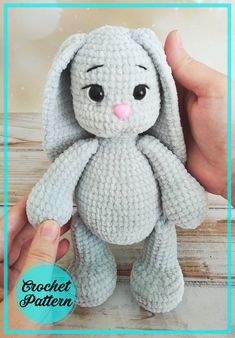 a crocheted stuffed animal is being held up by someone's hand with the text, crochet pattern