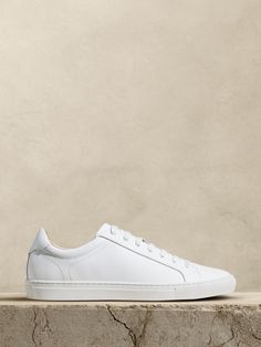 We designed this leather sneaker with a minimalist silhouette to offset athletic appeal with a bit of elegance.  We also added lightweight, durable OrthoLite® performance insoles for breathable cushioning that wicks away moisture for ultimate comfort.  Leather uppers.  Rubber soles.  B width. White Leather Dress, Minimalist Silhouette, White Leather Sneakers, White Sneakers Women, Minimal Outfit, White Trainers, White Sneakers, Wicks, Sneakers White