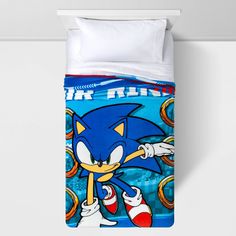 an image of a bed set with sonic the hedgehog on it's cover