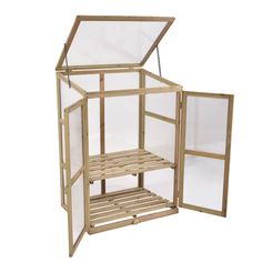 a small wooden structure with glass doors on the top and bottom sides, in front of a white background