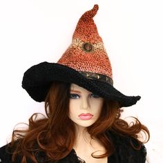 "Ready for the Renfair, cosplay, a LARP witch, sorceror, wizard, sorceress, or just because you love all things mystical - This coral Cabochon witch hat is firmly shaped but soft to wear. I crocheted this in shades of rusty orange and brown recycled polyester, and the tip is naturally shaped. A beautiful vintage metal and enamel cabochon pin is attached mid-center. The black brim is wired so you can play with the shape for that perfect look. Folds flat for travel. -This soft witchy hat has some stretch so it will fit between 21\" to 23.5\" head circumference. -3.5\" brim How to measure your head: - Using a fabric tape measure or a string, place it flat against your head, and measure around the area directly above your ears. - Keep your tape measure/string as level as possible. Do not put y Halloween Costume Cap, Witchy Brimmed Mini Hats For Halloween, Witchy Hats For Halloween Costume Party, Adjustable Halloween Costume Hat, Halloween Costume Hats And Headpieces, Halloween Costume Party Cap, Adjustable Wide Brim Mini Hat For Costumes, Witchy Mini Hats For Halloween, Halloween Adjustable Top Hat With Curved Brim