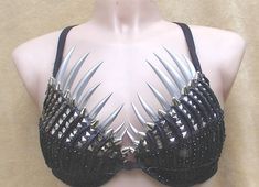 This Custom bra is guaranteed to get attention. Made of various embellishments and textures to make anyone who wears it feel like a bad ass. Free shipping within the USA. Please contact me for shipping outside the USA. Fashion Boutique Interior, Decorated Bras, Festival Fashion Outfit, Diy Bra, Fashion Background, Rave Bra, Head Dress, Movies Outfit, Rock Chic