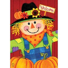 a welcome flag with a scarecrow and pumpkins on the front, hanging from a wooden pole