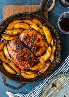 chicken and potatoes in a skillet with sauce