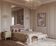 an elegant bedroom with chandelier and pink bedding