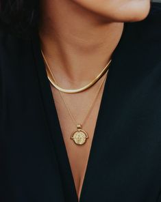 Lucy Williams Medium Engravable Roman Arc Coin Necklace | 18k Gold Plated. Inspired by Ancient Iconography, the Inspiration for this Lucy Williams X Missoma Collection Came After a Trip to Italy. This Design Features an Engravable 18K Gold-Plated Coin Depicting an Ancient Roman Icon, Partially Encased by a Statement Roman Arc. Layer for Less When Bought as a Set Lucy Williams Roman Coin Malachite Necklace Set. Please Note: Engraving Items May Take 2 Working Days to Process. Pendant Metal: 18K Gold Plated on Brass Pendant Dimensions: 22mm X 27 mm Chain Metal: 18K Gold Vermeil on Sterling Silver Medium Rope Chain: Total Length 500mm with Continuous Extensions from 460mm - 500mm Weight: 7g Product Code: Rc-G-N8-Ns-Ch5-R Refined Gold Round Jewelry, Refined Round Gold Jewelry, Plated Yellow Gold Pendant Chain Necklace, Gold Snake Chain Jewelry With Coin Pendant, Refined Hallmarked Jewelry For Gift, Yellow Gold Necklace With Round Pendant, Refined Hallmarked Jewelry Gift, Refined Gold Jewelry For Anniversary, Refined Sterling Silver Round Pendant Jewelry