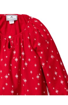 Bring a little vintage-inspired charm to your kiddo's bedtime with this long-sleeve nightgown cut from a soft cotton blend featuring a whimsical star print. Meets Consumer Product Safety Commission's flammability standards for children's sleepwear Front keyhole with button-and-loop closure 60% cotton, 40% modacrylic Machine wash, tumble dry Imported Red Cotton Nightgown For Sleepover, Red Cotton Nightgown For Loungewear, Red Cotton Nightgown For Pajama Party, Red Long Sleeve Nightgown For Bedtime, Red Long Sleeve Nightgown, Red Long Sleeve Tops For Pajama Party, Red Cotton Sleep Dress, Red Long Sleeve Sleep Top, Christmas Nightgowns