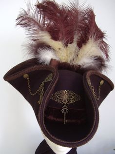 Brown Steampunk Brass Tricorn cockade The Lady Ely Steampunk Costume Hat For Carnival, Steampunk Brimmed Costume Hat For Cosplay, Feather Hat Pirate, Steampunk Horn Hat, Steampunk Brown Leather Top Hat, Pirate Halloween, Pirate Woman