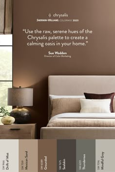 a bedroom with brown walls and white bedding in the center is an image of a quote on the wall