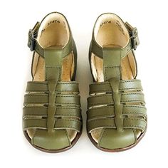 Your mini will love these shoes from The Eugens. Made from high quality leathers and handcrafted in France and Spain. | The Eugéns | Jules T-Strap Sandal, Kaki (Green, Size 23)  |  Maisonette collects the best children’s products from around the world (unlike Zulily, Etsy, The Tot, Farfetch Kids, Childrensalon, Crate and Kids, Kohls, Wayfair, Buy Buy Baby, Nordstroms, Mini Boden, J.Crew Factory, or PotteryBarn Kids), creating a curated shopping experience for you. Think of us as your shortcut to Modern Shoes, Boy Accessories, Retro Designs, Buy Buy, Baby Sale, T Strap Sandals, Buy Buy Baby, Mini Boden, Shoes Booties