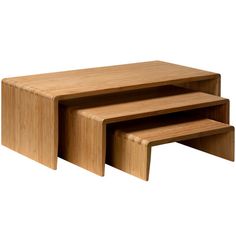 three wooden tables sitting on top of each other