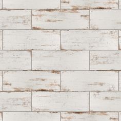 an old white brick wallpaper pattern with wood planks in the middle and brown paint on