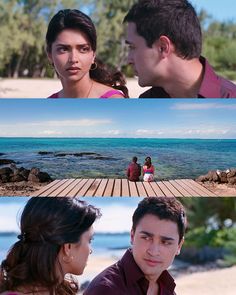 two people sitting on a bench in front of the ocean and one person looking at each other