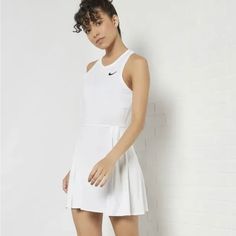 Nike Court Dri-Fit Adv Tennis Dress Womens White Slim Fit - Xlarge- New Nike Summer Dresses, Casual White Tennis Dress For Daywear, White Fitted Tennis Dress For Daywear, White Tennis Dress For Spring Daywear, White Stretch Dresses For Daywear, White Spring Tennis Dress For Daywear, White Fitted Short Tennis Dress, Casual Nike Sleeveless Dress, Nike Casual Sleeveless Dress