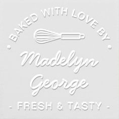 a white sign that says baked with love by madelyn george fresh & tasty