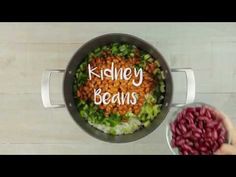 someone is cooking beans in a pot with the words kidney beans