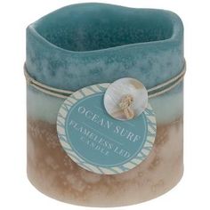 an ocean - inspired candle with a label on it