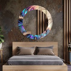 a bedroom with a large circular mirror on the wall next to a bed and nightstand