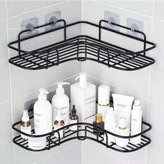 a corner shelf with several bottles and soaps on it in a bathroom area that is tiled