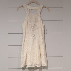 Jodi Kristopher Cream / Ivory Embroidered And Lace High Neck Dress Size 1 Nwt - Please View Pics For Measurements. Beautiful Cream Dress Which Is Great For Any Special Occasion. Back Is Stunning. Hits Above The Knee. Special Occasion / Formal / Embroidered / Lace / Homecoming / Wedding / Graduation Casual Cream Lace Mini Dress, Sleeveless Beige Dress With Lace Work, Beige Sleeveless Dress With Lace Work, Cream Lace Crochet Dress For Spring, Spring Cream Lace Crochet Dress, Casual Cream Lace Dress, Cream Sleeveless Lace Crochet Dress, Casual Cream Crochet Dress For Spring, Off White Lace Dress With Lace Trim For Summer