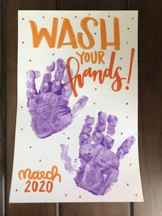 a sign that reads wash your hands march 20, 2020 with two hand prints on it