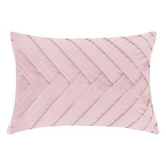 a pink pillow with pleated lines on it