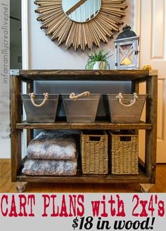 a wooden shelf with baskets on it in front of a mirror