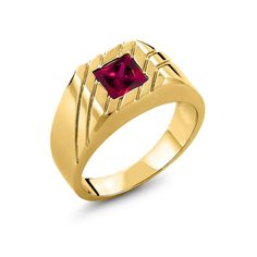 a yellow gold ring with a square red stone in the center and diagonal lines around it