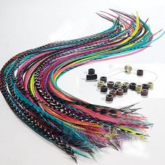 Introducing our set of 20 Loose Feather Hair Extensions in a colorful mix of rainbow hues. Each feather is expertly crafted with salon-quality rooster feathers that are lightweight and easy to style, just like your natural hair. Our kit includes 20 microbeads and a loop tool for easy installation, so you can rock your new look in no time. Please note that as each feather is unique, the actual colors may vary slightly from what you see in the picture. This hair feather extension is made of 100% real rooster feathers and measures 8-11 inches (20-28cm) in length. These feathers can be washed and styled, including flat ironed and curled, just like your natural hair. These high-quality feathers are salon-grade and can last for several months with proper care. Looking to add some pizzazz to your Feather Extensions, Bead Hair, Natural Hair Salons, Feather Hair Extensions, Rooster Feathers, Turquoise Blue Color, Hippie Hair, Synthetic Dreadlocks, Feather Hair