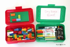 two plastic containers filled with legos and crayons