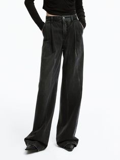 MO&Co. Women's Wide Leg Pleated Jeans Made from high-quality cotton, these jeans are perfect for a casual yet chic look. The faded black wash adds a touch of edginess while the high waist and wide leg silhouette create a flattering shape. Pair with a fitted top to enhance your long and lean figure. Features : - Wide leg, high-rise, floor-length​- Vintage washed faded details and pleated Code: MBD1JENT04The back length of size M/27 is 108cmMATERIALS & CARE Material: 100% CottonDenim products have Wide Black Jeans, Pleated Jeans, Fitted Top, Wide Leg Jeans, Floor Length, Black Jeans, High Waist, Wide Leg, High Rise