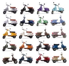 many different colored scooters parked next to each other on a white surface,