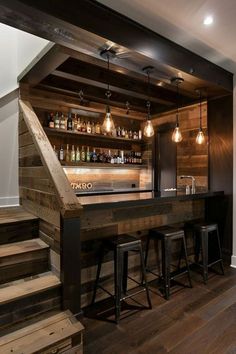 a home bar with stools and wooden shelves