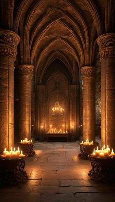 candles are lit in the middle of an old building with stone arches and vaulted ceilings