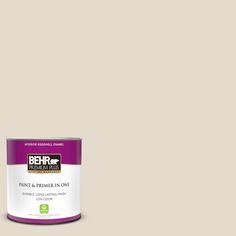 the behr ultra paint is shown in an open, beige color with a light brown base