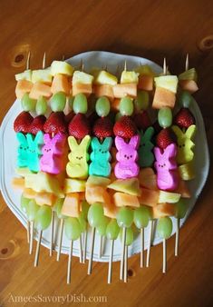 an image of some fruit kabobs on a plate