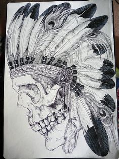 a drawing of a skull with feathers on it