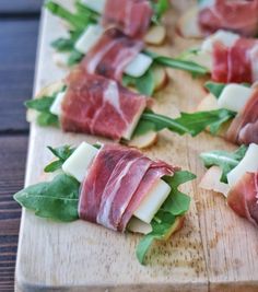 some food is laying out on a cutting board