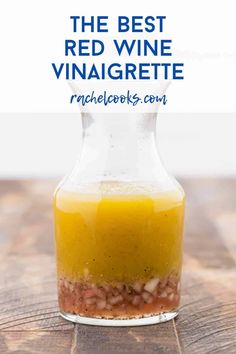 the best red wine vinaigrete recipe in a glass bottle on a wooden table