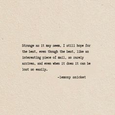 an old typewriter with the words, strange as it may seem, i still hope for