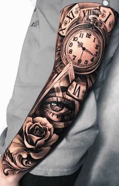 a man with a clock and roses tattoo on his arm