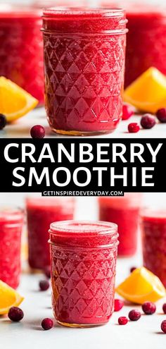 cranberry smoothie in mason jars with orange slices and cranberries