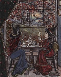 two women sitting at a table in front of a window with an owl on it