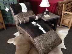 Cowhide and Tooled Leather Chaise Lounge Cowhide Bar Stools, Pendleton Pillow, Cowhide Bench, Lodge Furniture, Cowhide Ottoman, Leather Chaise Lounge, Ranch Furniture, Cowhide Furniture, Barnwood Furniture