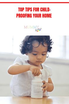 a young child holding a bottle of milk with the words top tips for child - proofing your home