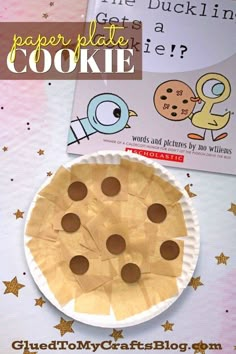 a paper plate cookie on top of a table