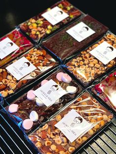 chocolates and candies are arranged on a rack