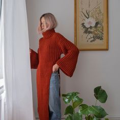 "Stylish asymmetric sweater with extra long wide sleeves in terra. Made with soft wool blend yarn. Materials: Wool / Acrylic (60/40) Color: terra Best fit: size S/M (oversized fit) Measurements: Width (from underarm to underarm): 19\" = 48 cm Length: 45.5\" = 116 cm Sleeve length (from the neck): 26.5\" = 67 cm Measures of Model in the photo Size: S Chest: 33\" - 83 cm Waist: 24\" - 62 сm Hip: 35\" - 88 cm Height: 5′ 6″ CARE INSTRUCTIONS: DRY CLEAN is the best way. HAND WASH. Make sure to use cold water and neutral soap. The less you touch and agitate them, the better. Do not press. MASHINE WASH. Please use only cold water and gentle (hand) cycle. Do not use tumble dry. FLAT DRY - reshape the garment to it's original shape. KEEP FLAT only. Do not hang! You can message me and get some addit Knitted Outfits For Women, Turtleneck Sweater Outfit, Head Scarf Styles, Asymmetrical Sweater, Future Clothes, Womens Sweaters, Extra Long Sleeves, Oversized Knitted Sweaters, Long Knit