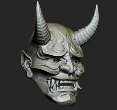 an artistic mask with horns and fangs on it's face is seen in this image