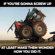 a tractor that is sitting on the ground with its wheels in it's tires